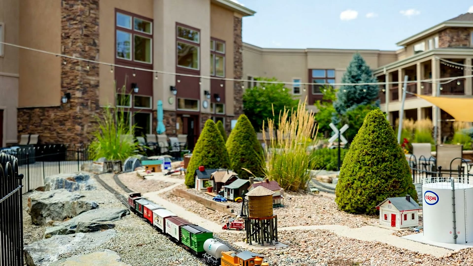 Model train garden in the Gardens on Quail courtyard