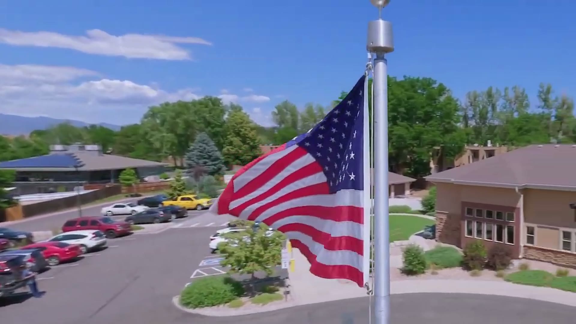 American flag flying above Gardens on Quail