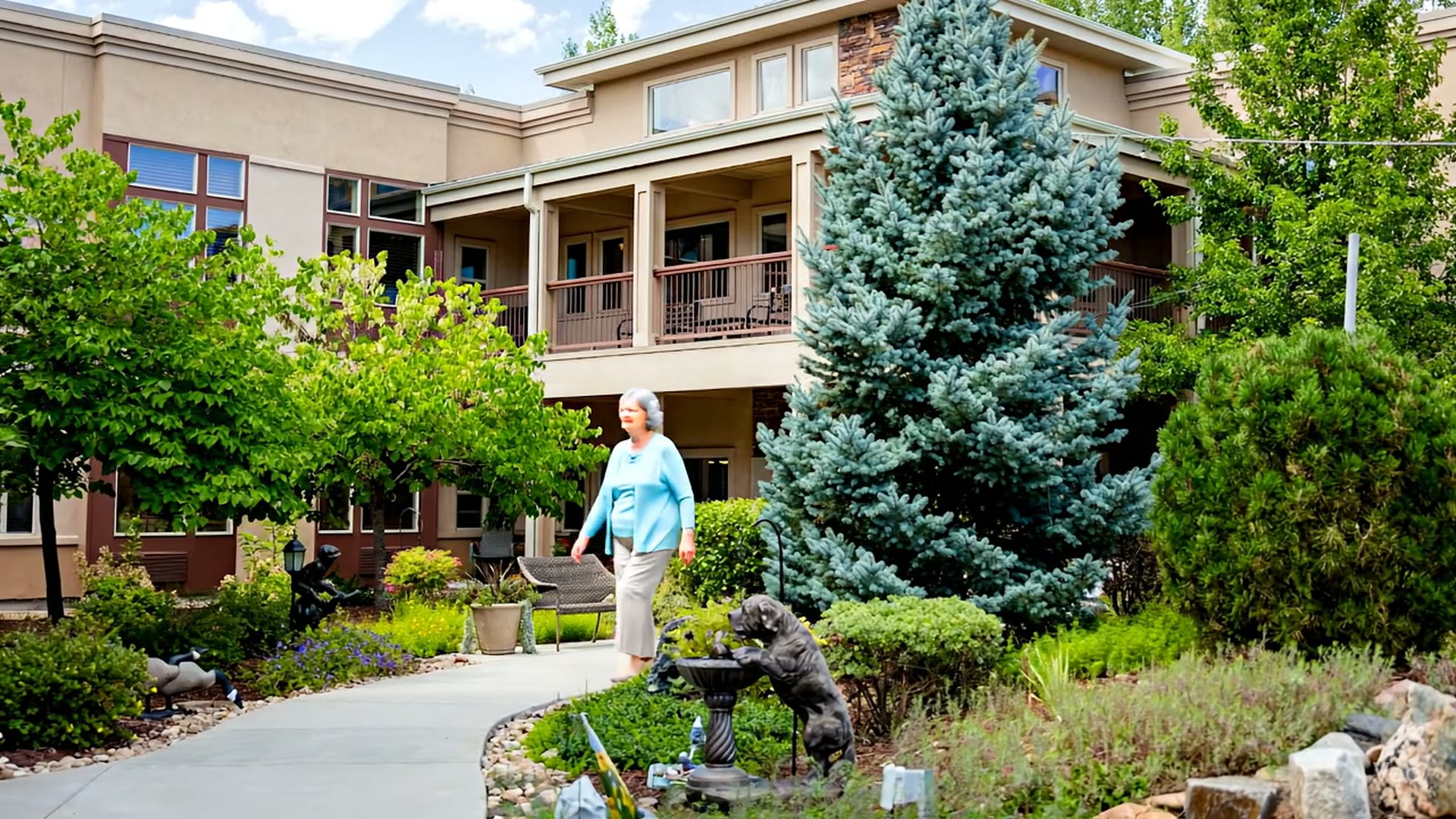 Memory care resident enjoying a calm daily-living moment at Gardens on Quail